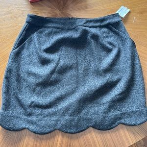 Charcoal grey skirt with scalloped hem